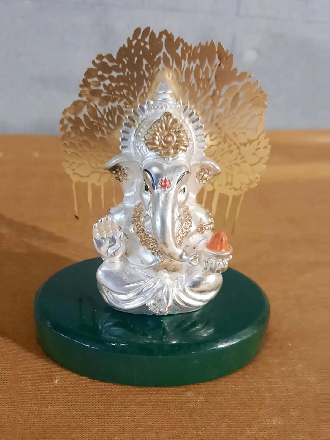

Order Happiness White & Green Lord Ganesha Polyresin Idol Showpiece