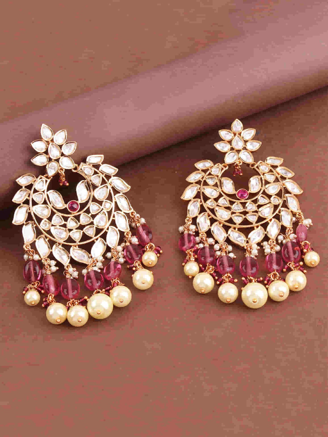 

Mirana Gold Plated Cubic Zirconia Studded Chandbalis