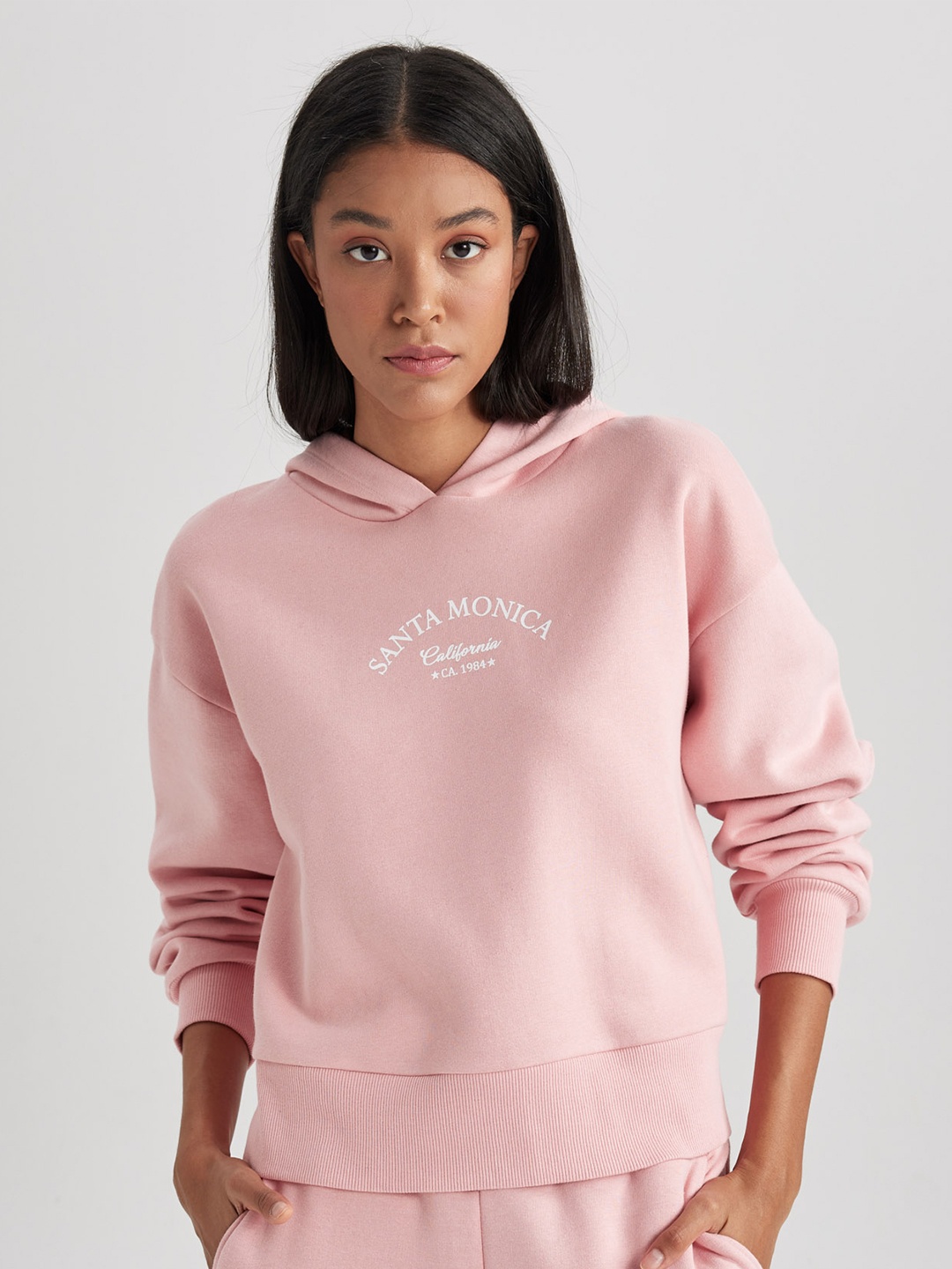 

DeFacto Minimal Print Detail Hooded Pullover Sweatshirt, Pink