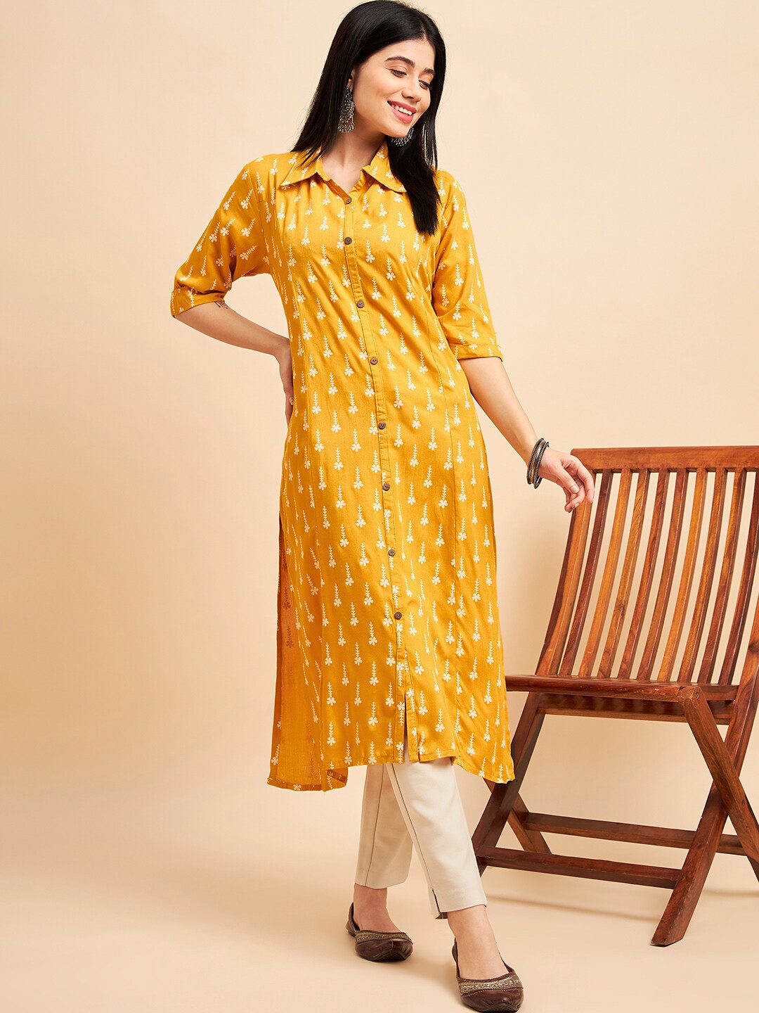 

Sangria Floral Printed Shirt Collar Panalled A Line Kurtas, Mustard