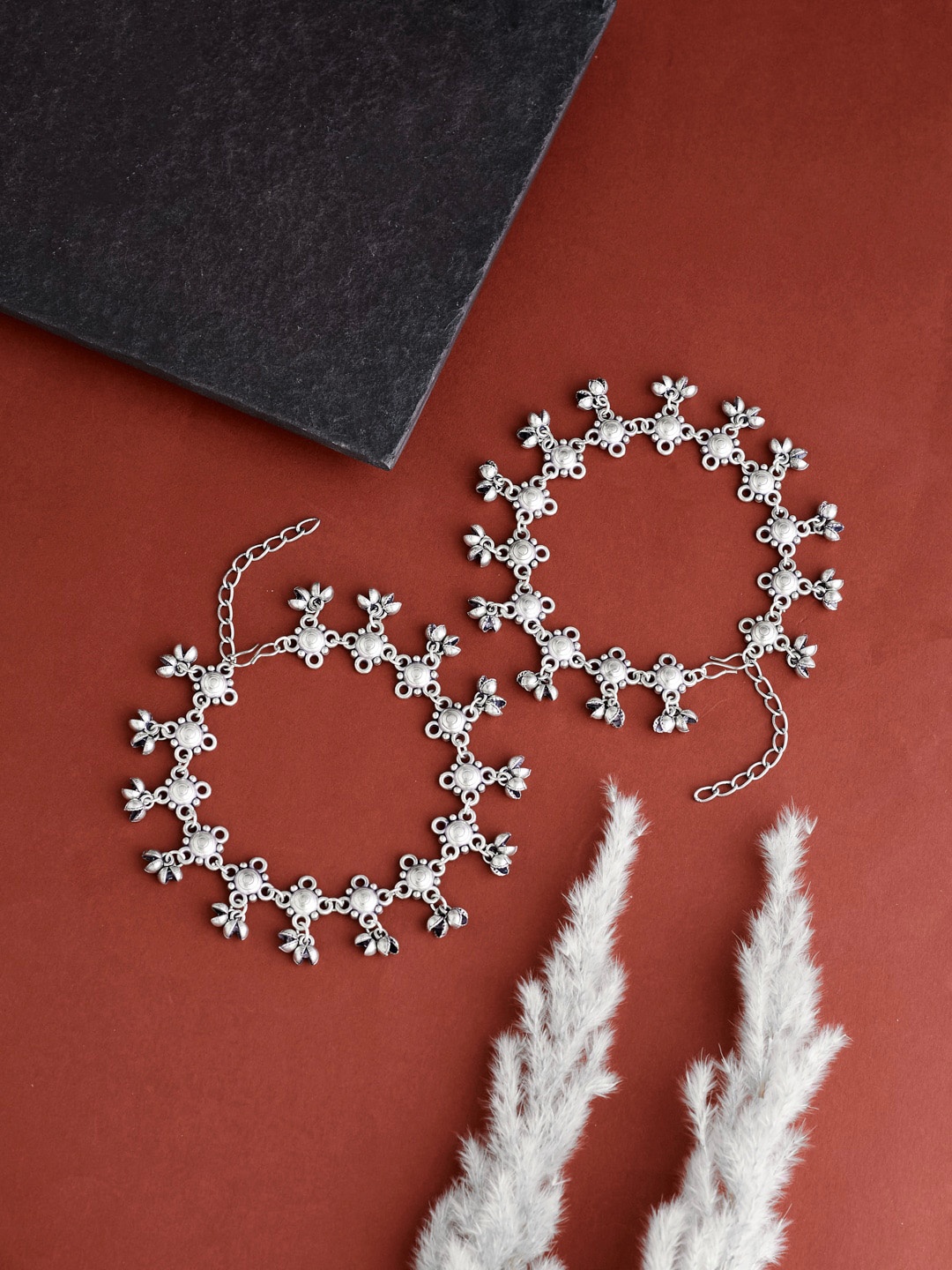 

ATIBELLE Set Of 2 Silver-Plated & Floral Shaped Ghunghroo Studded Anklets