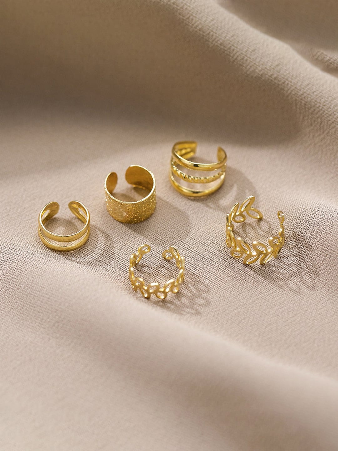 

VAGHBHATT Gold Plated Leaf And Geometric Shaped 5 Pieces Ear Cuffs