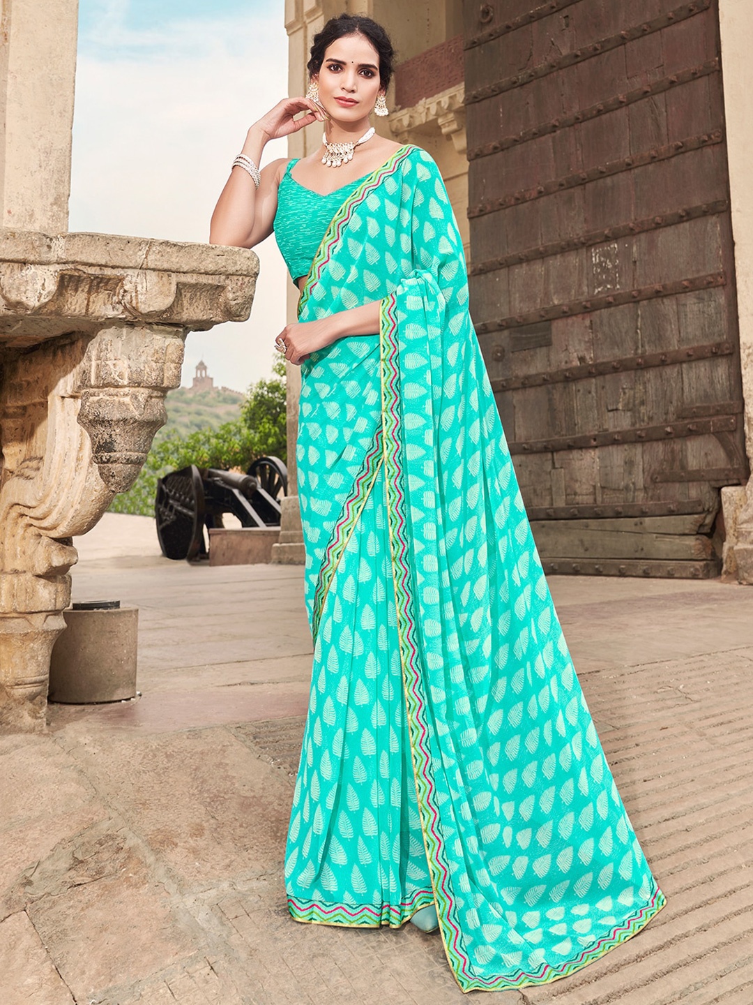 

SANSKAR Turquoise Blue & Off White Paisley Poly Georgette Saree