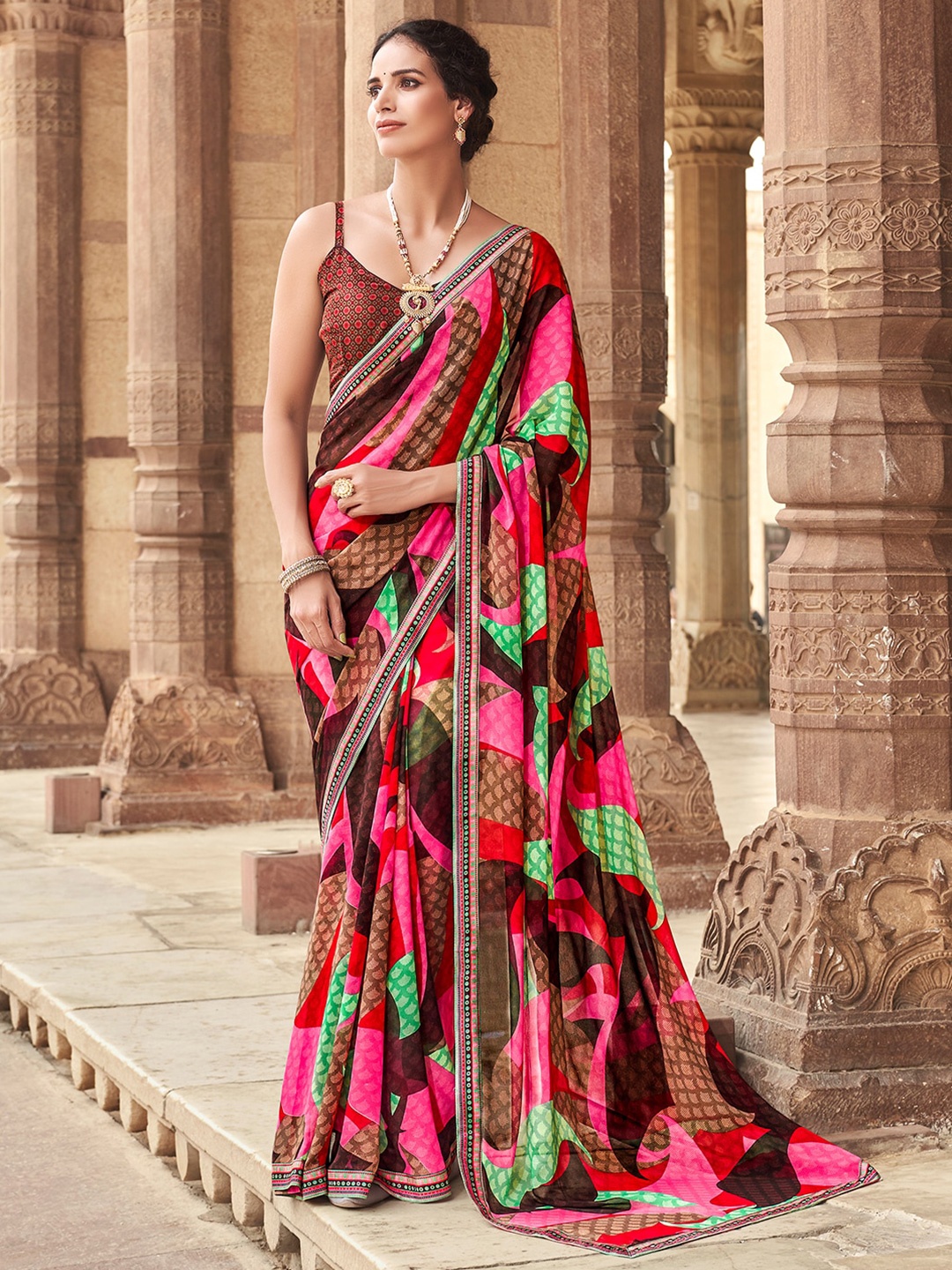 

SANSKAR Brown & Fuchsia Poly Georgette Saree