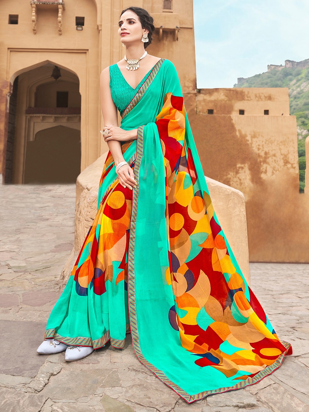 

SANSKAR Turquoise Blue & Red Poly Georgette Saree