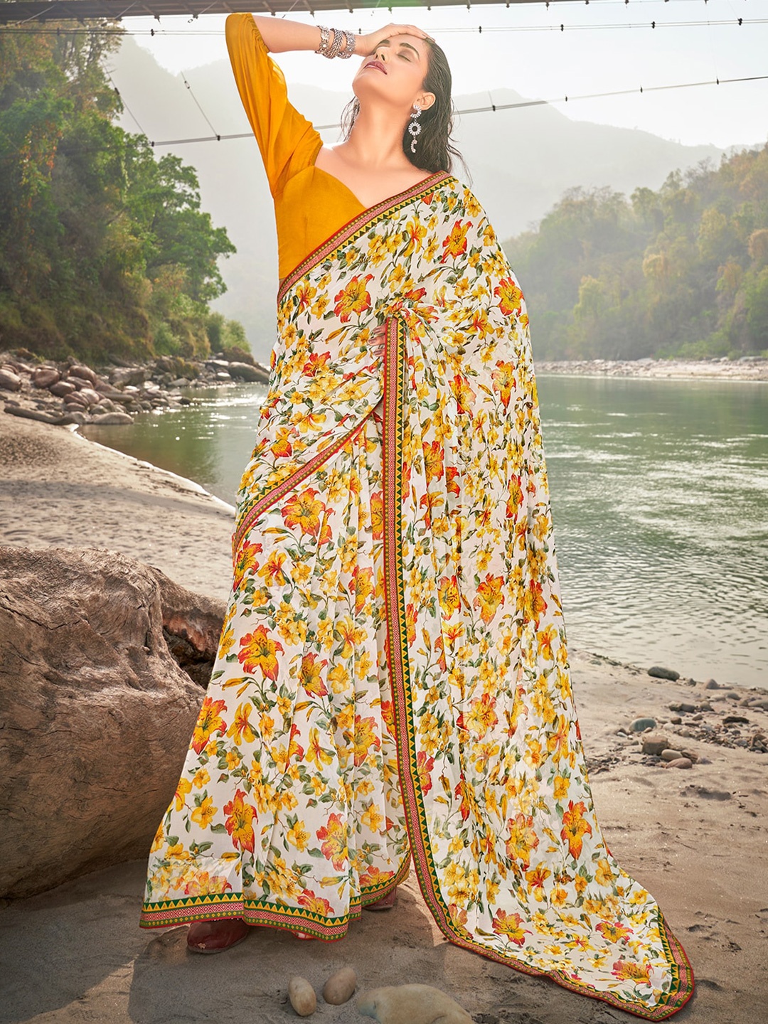 

SANSKAR Floral Printed Saree, Yellow