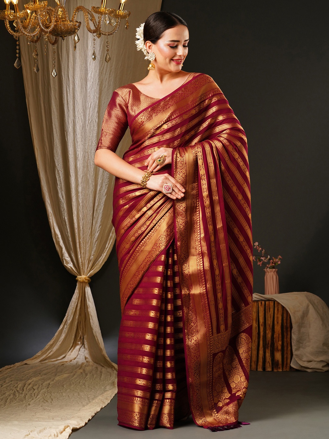 

Anouk Purple & Gold-Toned Ethnic Motifs Zari Pure Georgette Kanjeevaram Saree