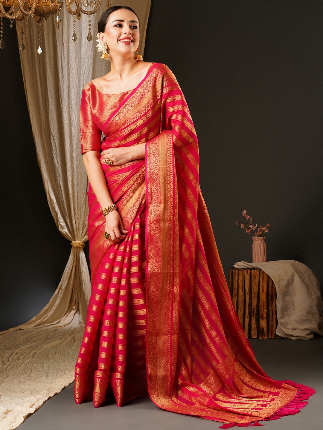 

Anouk Pink & Gold-Toned Ethnic Motifs Zari Pure Georgette Kanjeevaram Saree