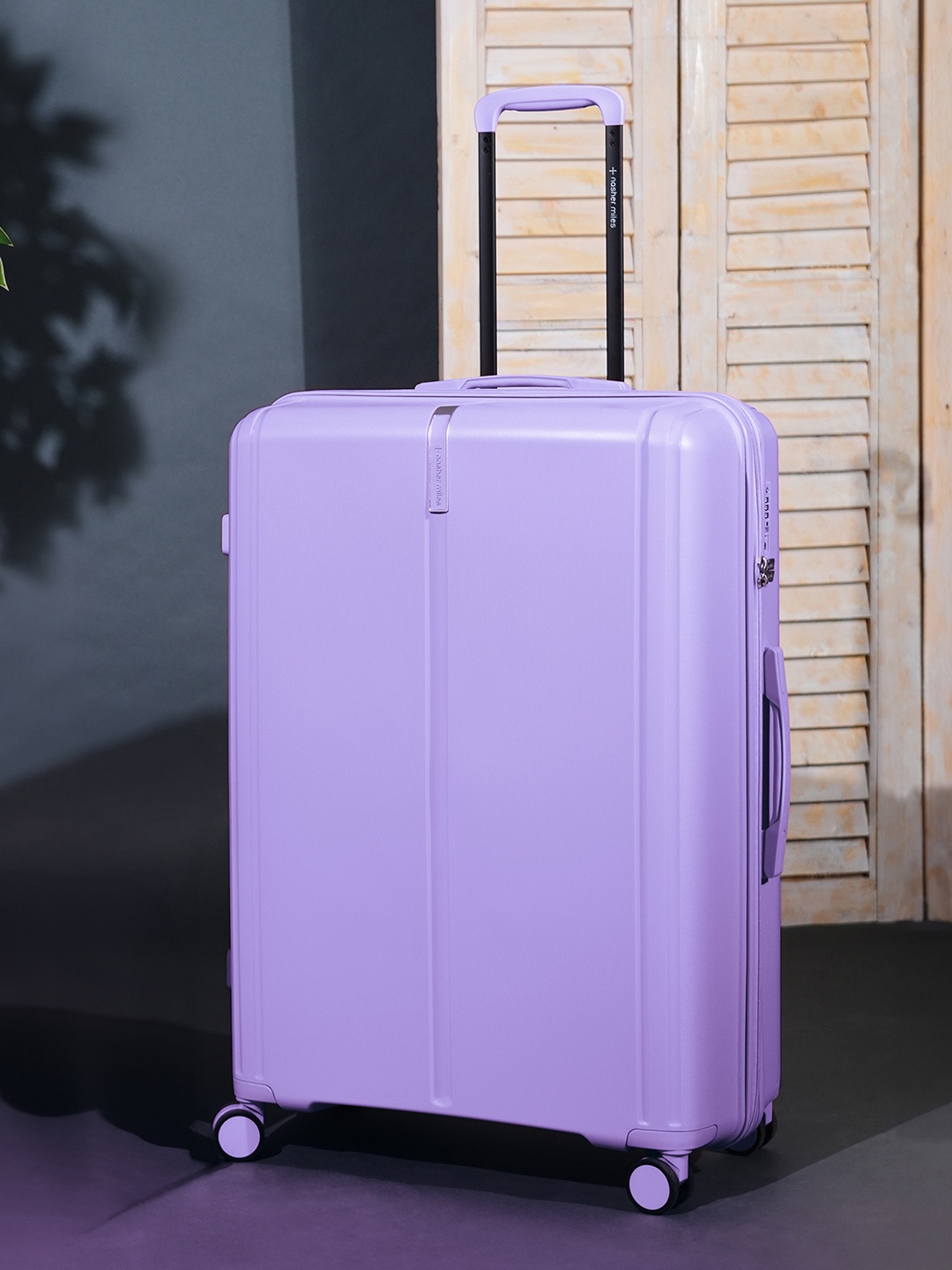 

Nasher Miles The Line 360-Degree Rotation Hard-Sided Medium Trolley Suitcase- 65cm, Lavender