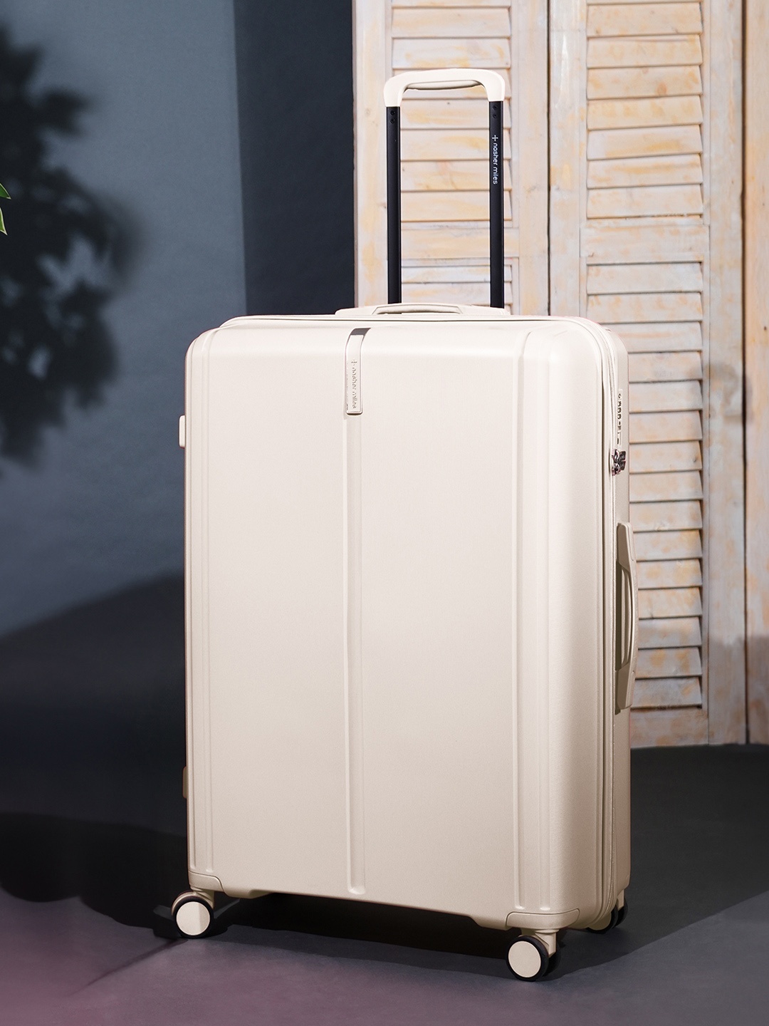 

Nasher Miles The Line Hard-Sided Medium Trolley Suitcase, White