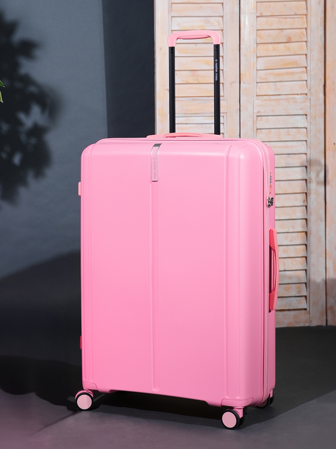 

Nasher Miles The Line Hard-Sided Light Weight Medium Trolley Suitcase, Pink