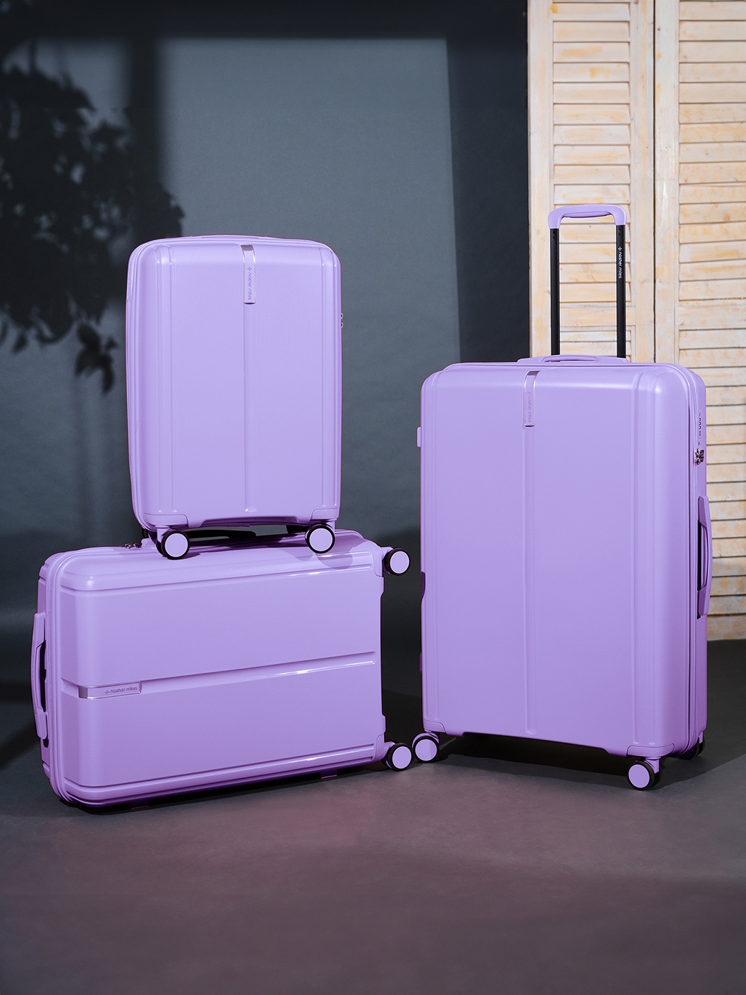 

Nasher Miles The Line Set Of 3 Hard-Sided Trolley Suitcase 55cm, 65 cm & 75 cm, Purple