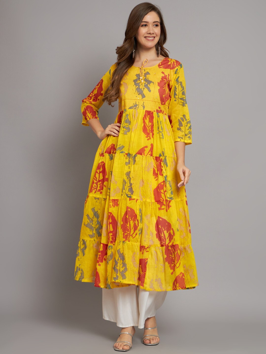 

Miramaar Floral Printed Tie-Up Neck Pure Cotton Sequined & Thread Work Anarkali Kurta, Yellow