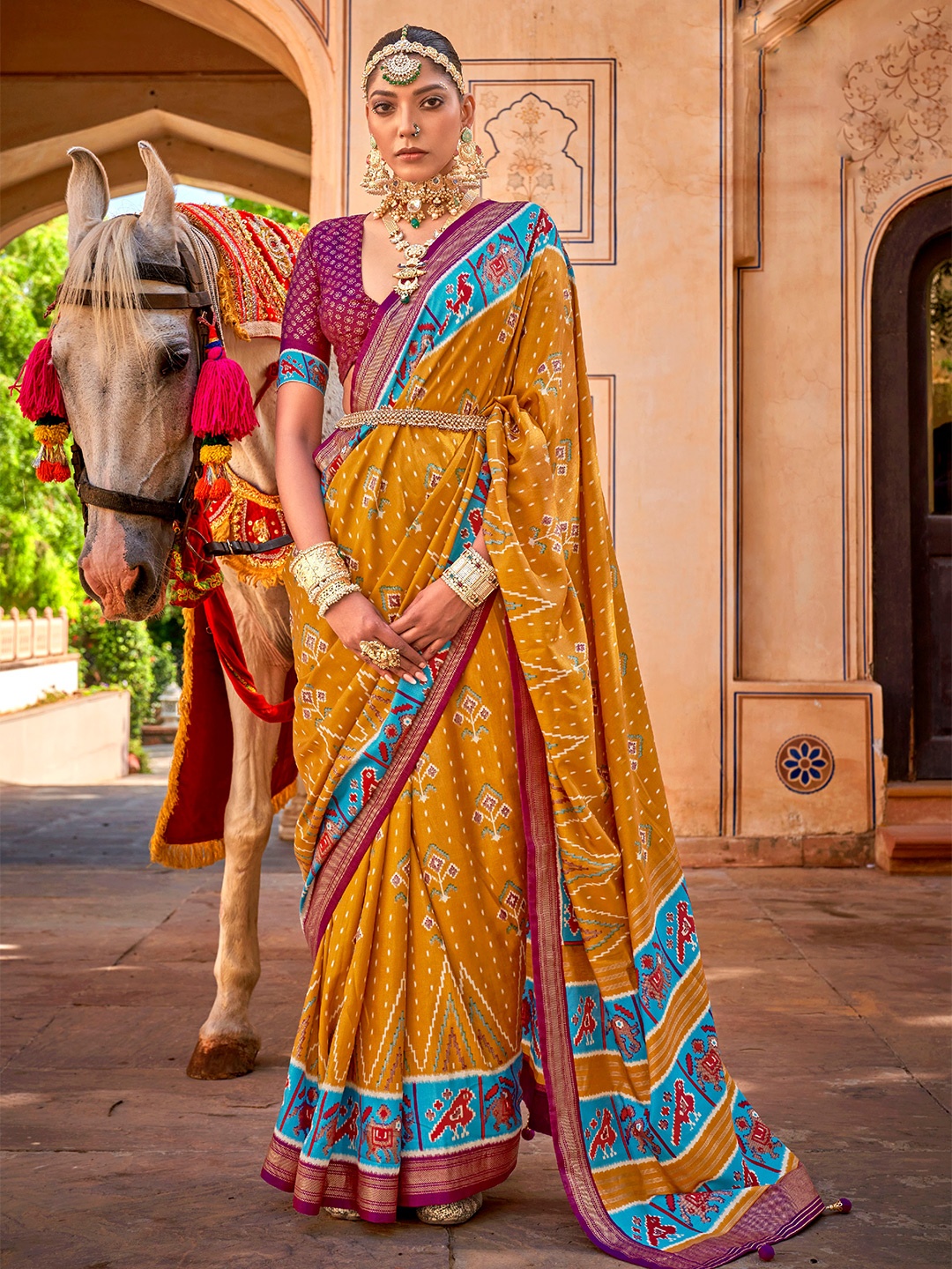 

Mitera Mustard & Magenta Zari Silk Blend Patola Saree