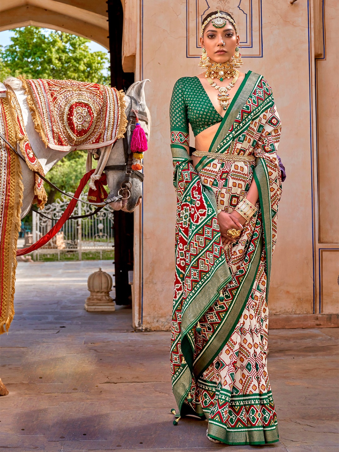 

Mitera Cream-Coloured & Green Tie and Dye Silk Blend Patola Saree