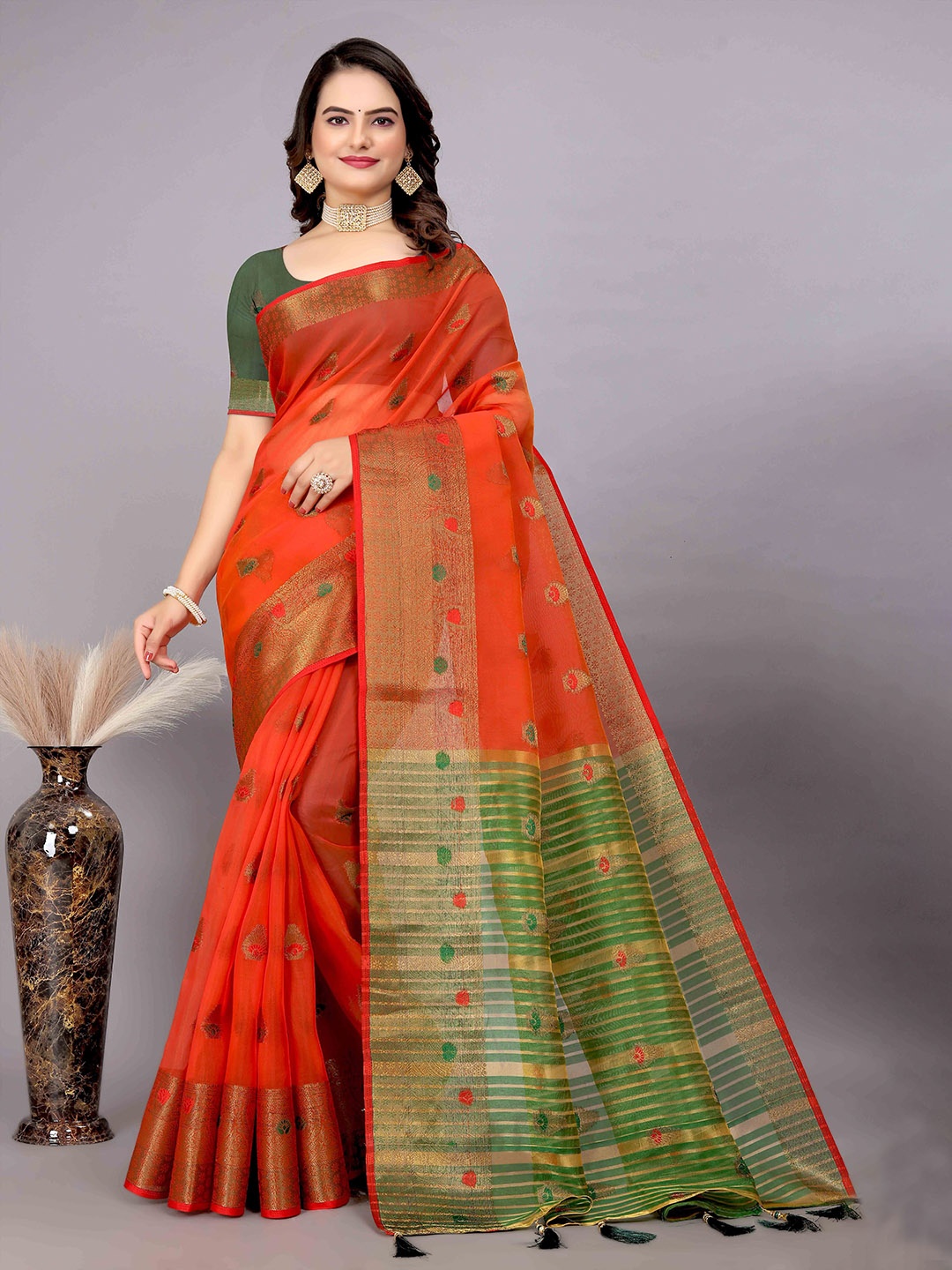 

Mitera Orange & Green Ethnic Motif Woven Design Zari Saree
