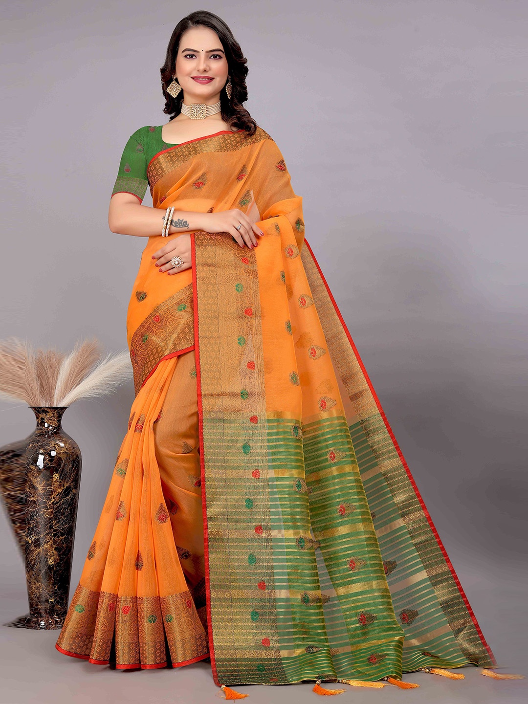 

Mitera Mustard & Green Ethnic Motif Woven Design Zari Saree