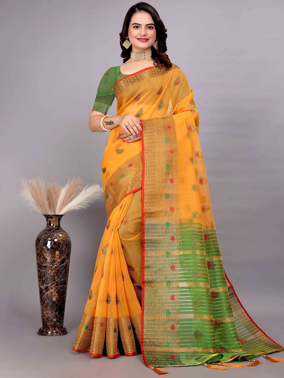 

Mitera Yellow & Green Ethnic Motifs Woven Design Zari Saree
