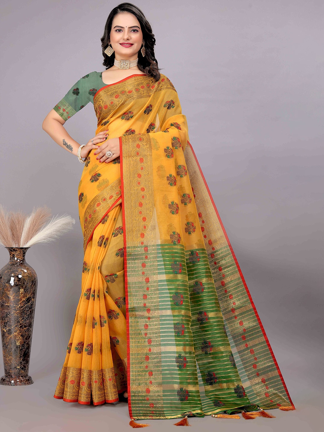 

Mitera Yellow & Green Ethnic Motifs Woven Design Zari Saree