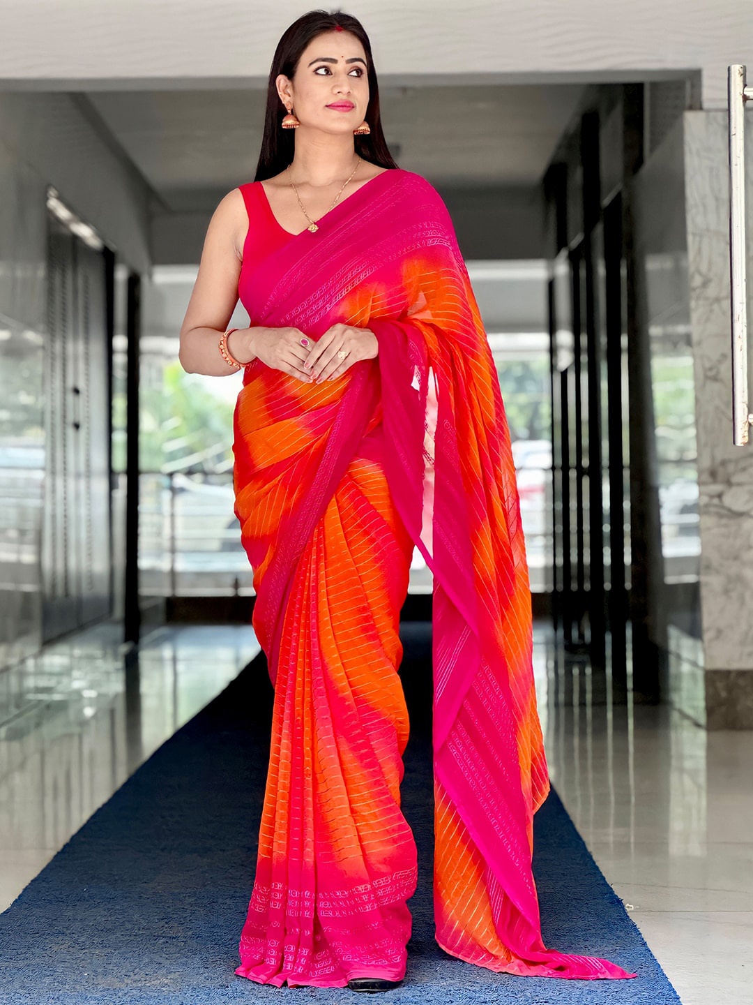 

Saree mall Embellished Sequinned Pure Georgette Sarees, Orange