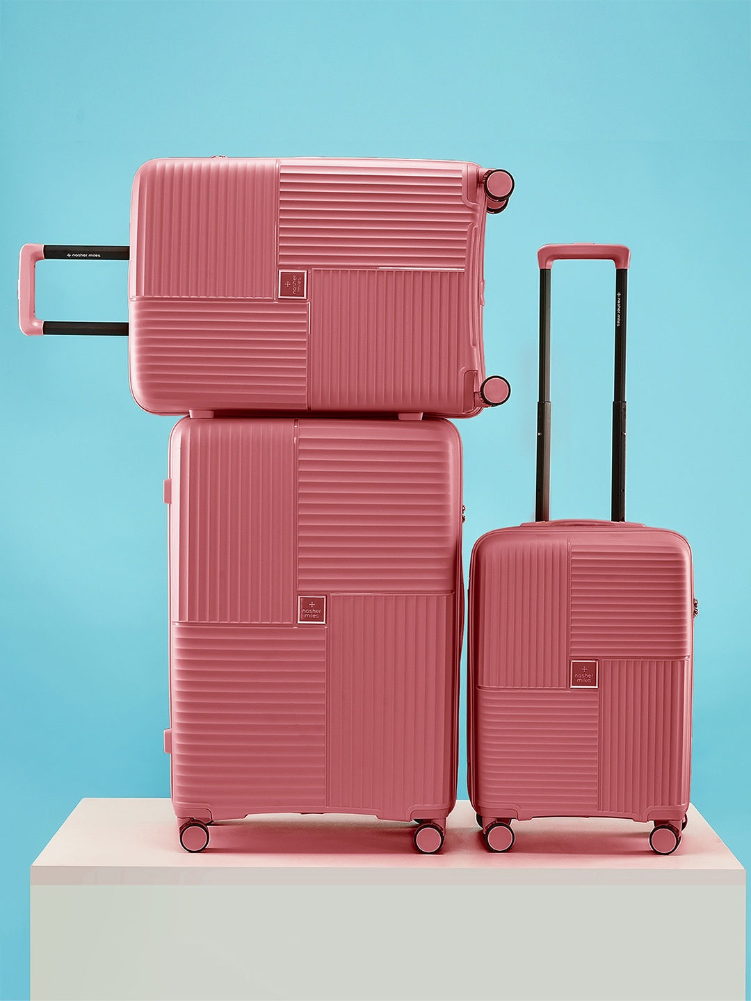 

Nasher Miles Singapore Hard Polypropylene Set of 3 S/M/L Rose Gold Trolley Bags 55-65-75cm, Pink