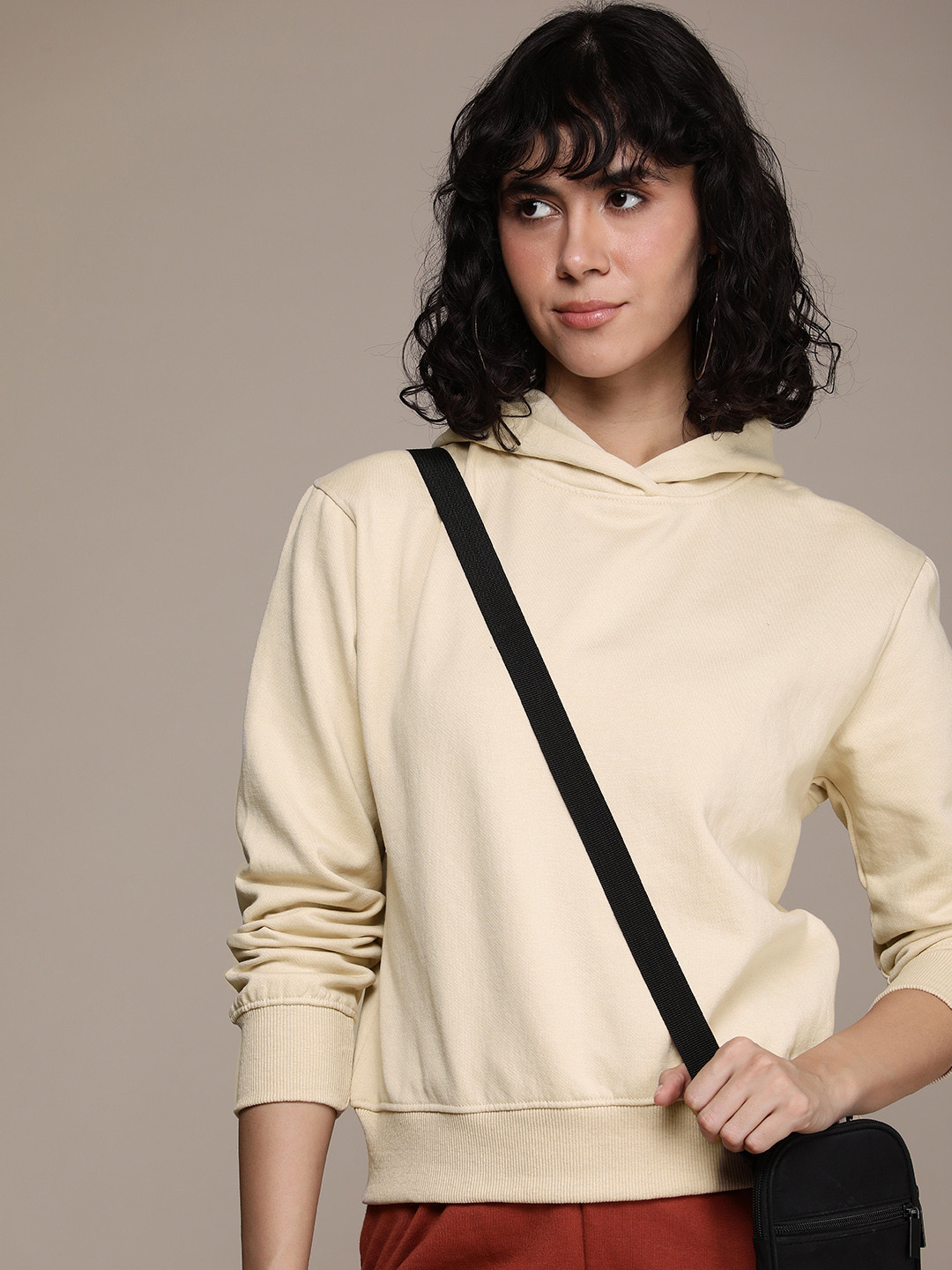 

Roadster Women Solid Hooded Sweatshirt, Beige