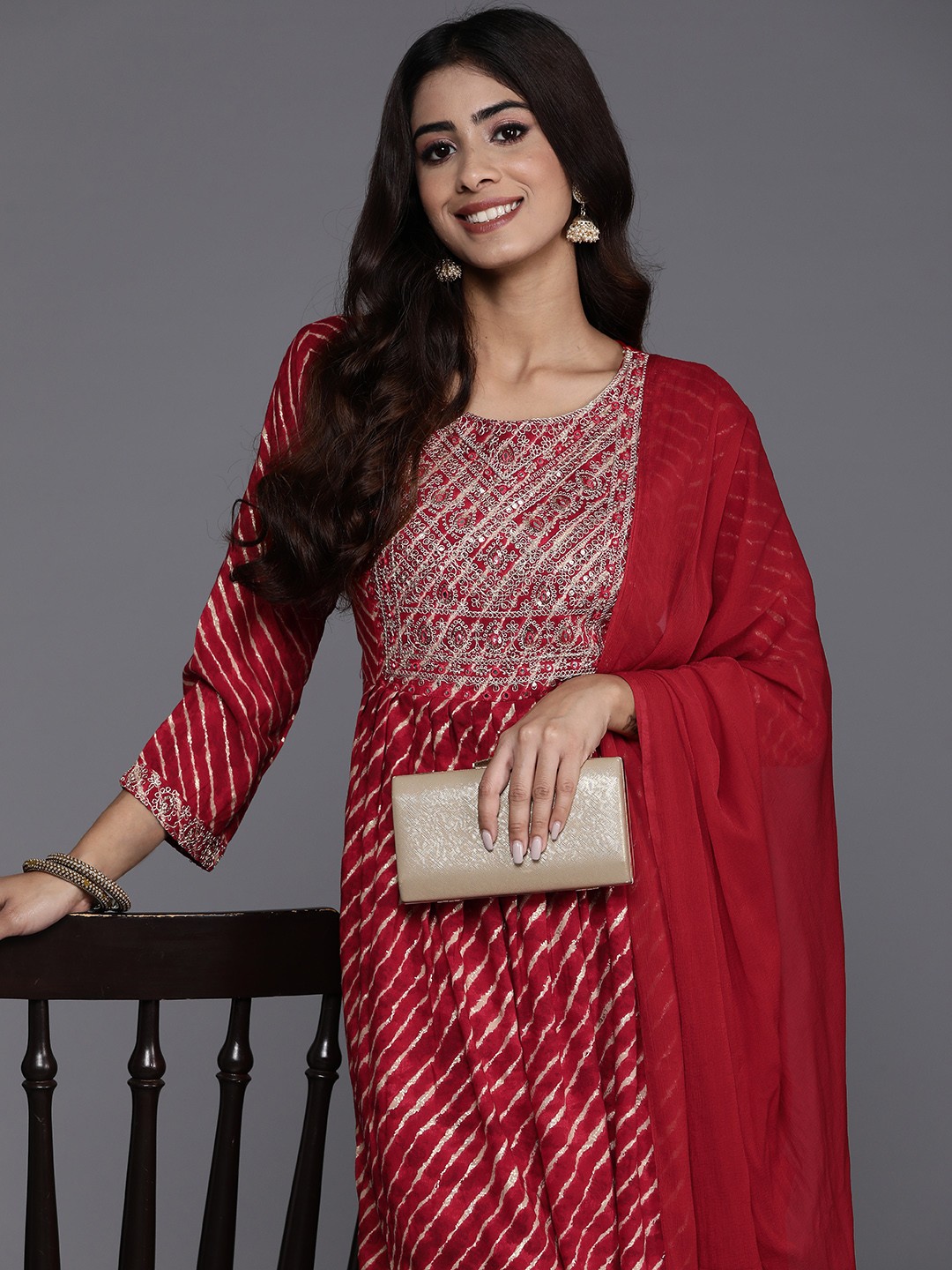 

Indo Era Women Yoke Design Regular Mirror Work Kurta with Trousers & Dupatta, Red