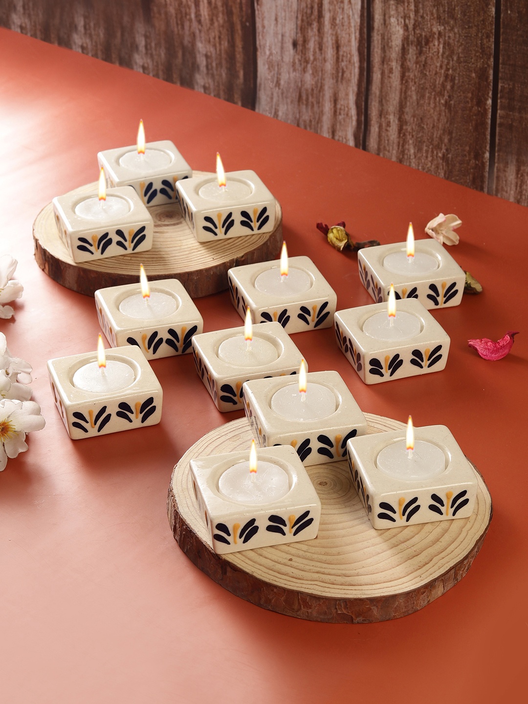 

VarEesha 12 Pcs White & Black Self Design Ceramic Tea Light Holders