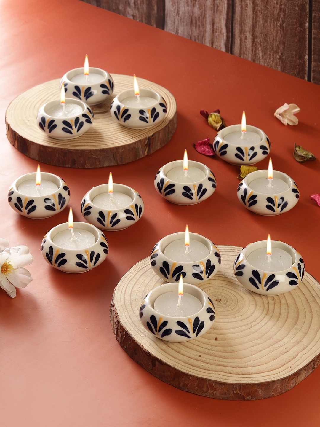 

VarEesha White & Black 12 Pieces Self-Designed Ceramic Tea Light Holders