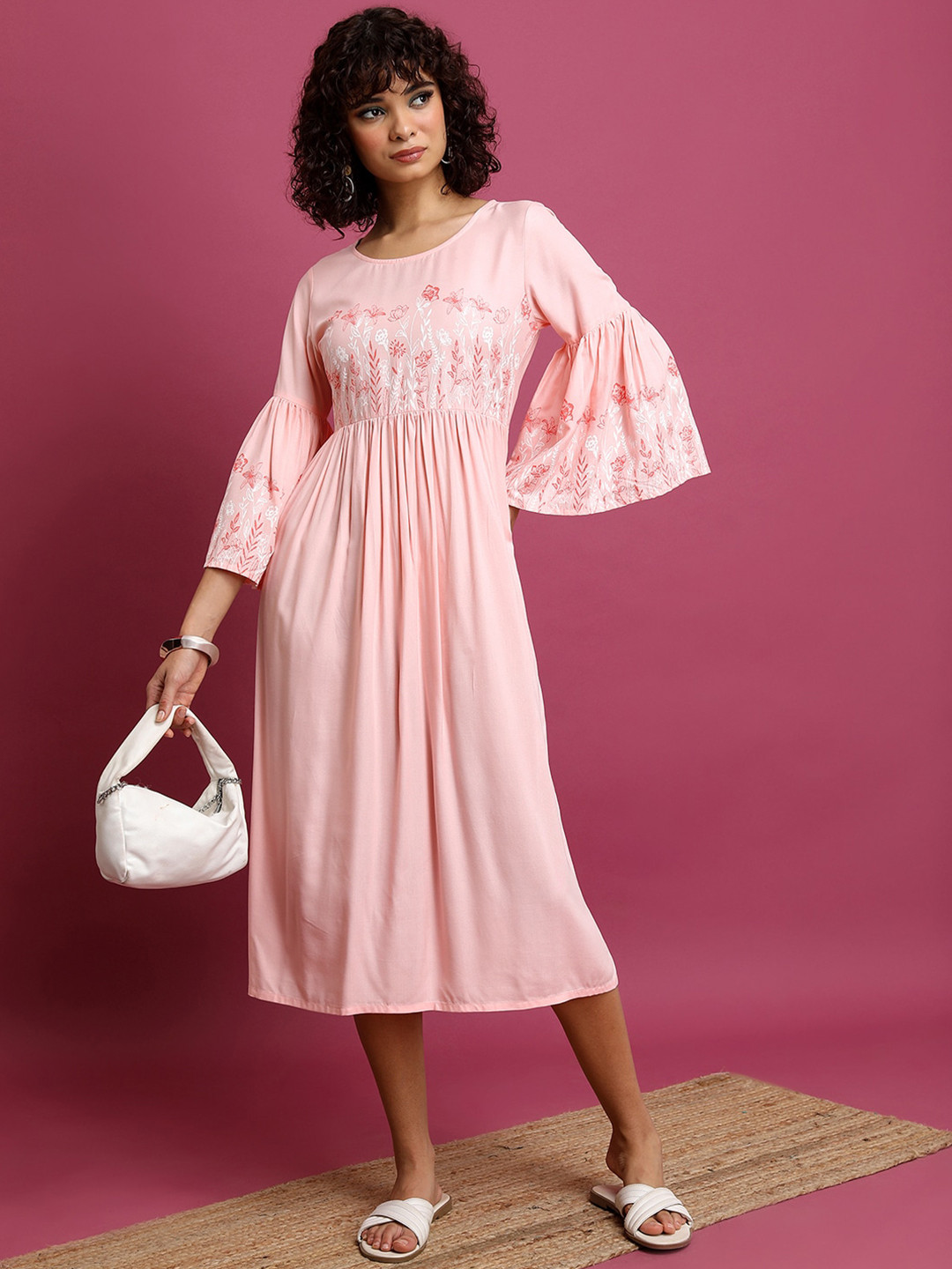 

Vishudh Pink Floral Printed Bell Sleeve Pleated A-Line Midi Dress