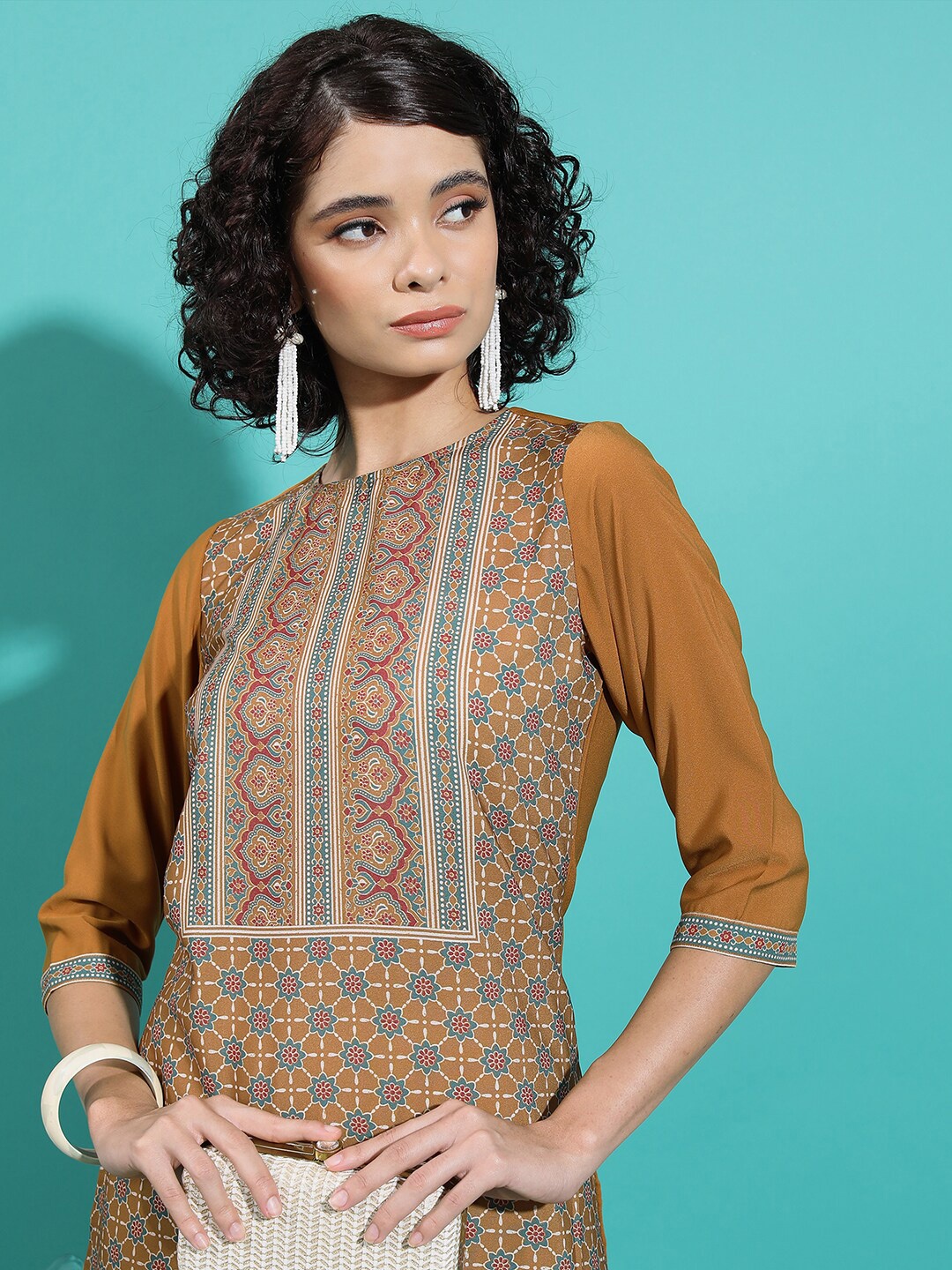 

Vishudh Rust Ethnic Motifs Printed Straight Kurta