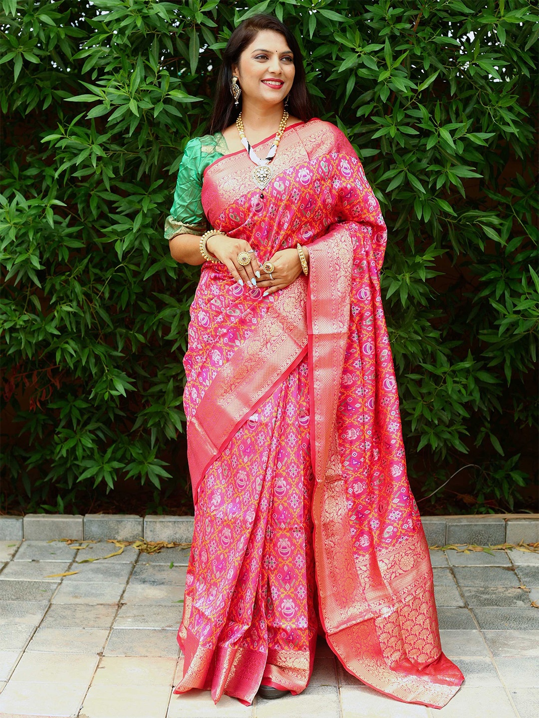 

Mitera Pink & Gold-Toned Ethnic Motifs Woven Design Zari Patola Saree