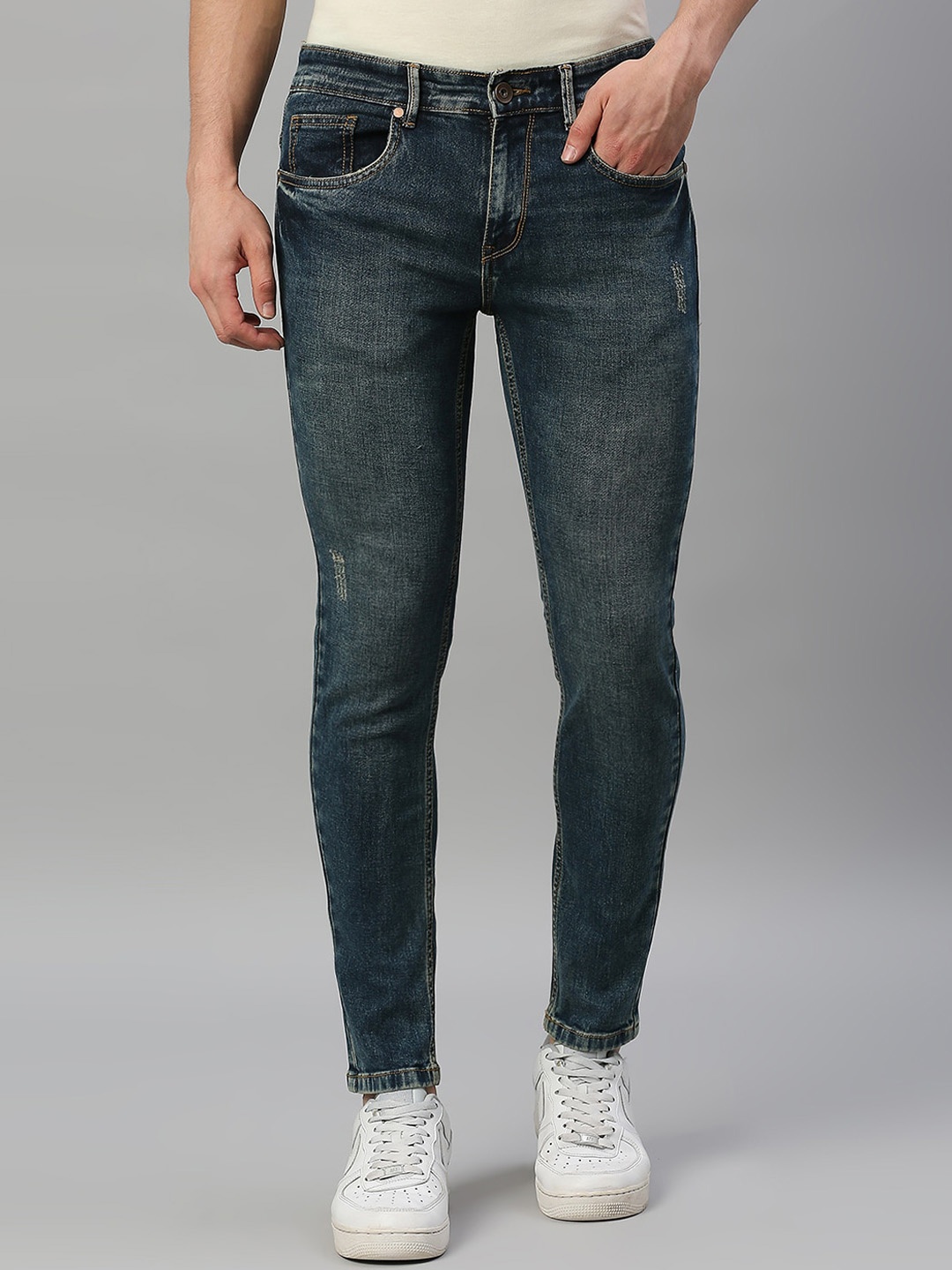 

Mast & Harbour Men Blue Slim Fit Mid Rise Mildly Distressed Heavy Fade Stretchable Jeans