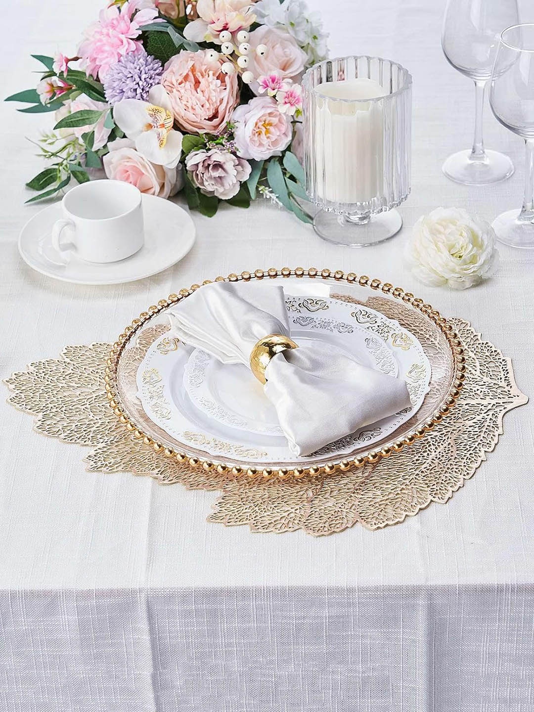 

Dakshya Industries Gold-Toned 2-Pieces Floral Leaf Shape Table Placemats