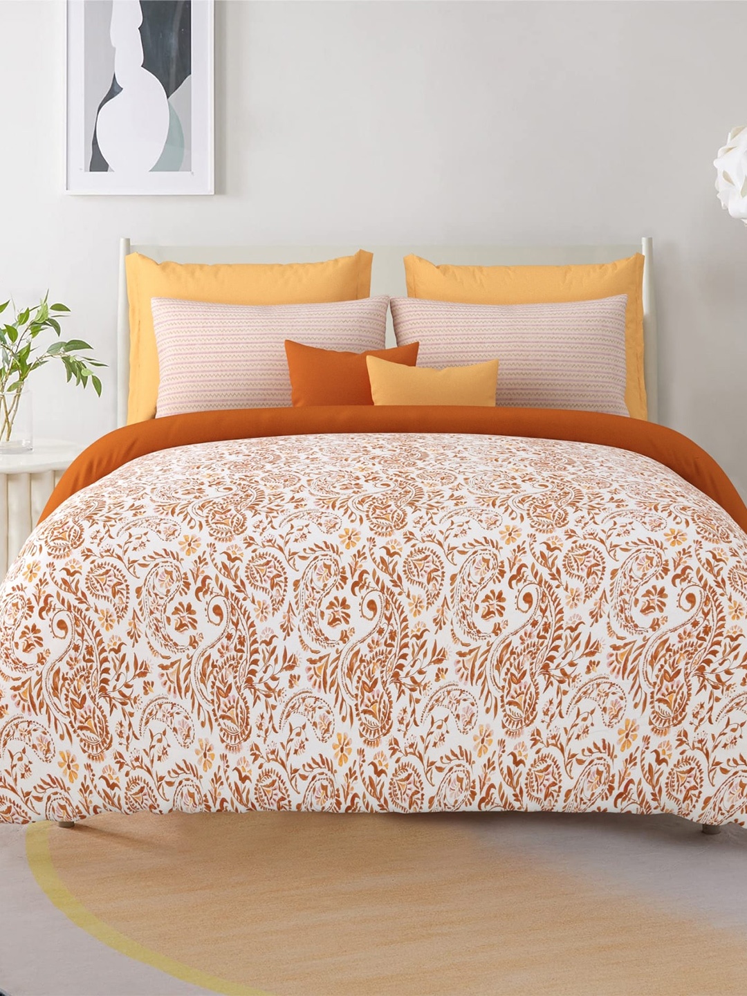 

Salona Bichona White & Brown Floral Cotton 120 TC Queen Bedsheet With 2 Pillow Covers