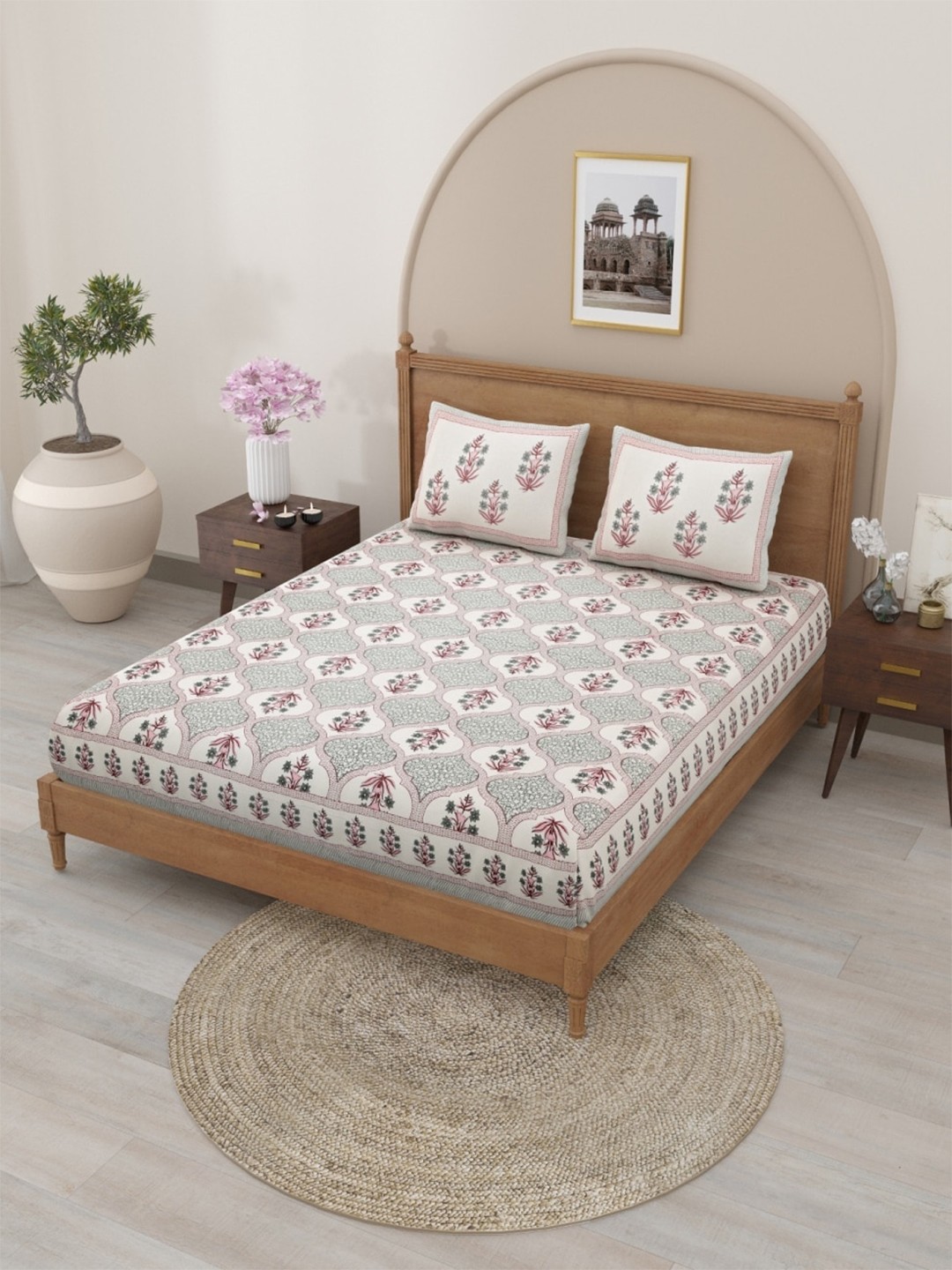 

Salona Bichona Pink & White Printed Cotton 120 TC Queen Bedsheet With 2 Pillow Covers