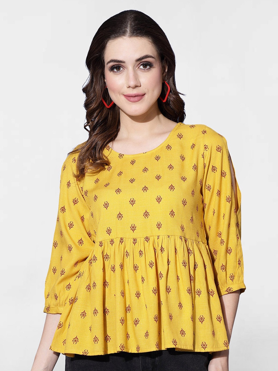 

Selvia Ethnic Motifs Printed Peplum Top, Mustard