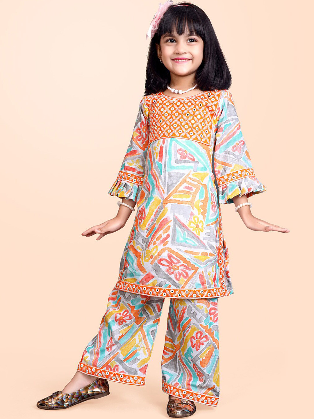 

BAESD Girls Geometric Printed Round Neck Mirror Work Pure Cotton Kurta With Palazzos, Orange