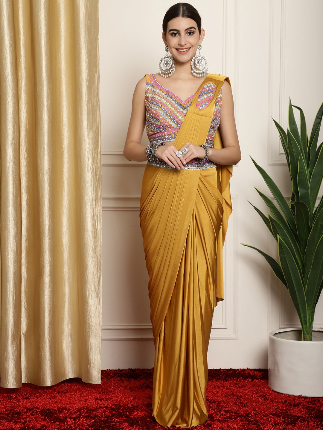 

Mitera Mustard & Pink Embroidered Ready to Wear Leheriya Saree