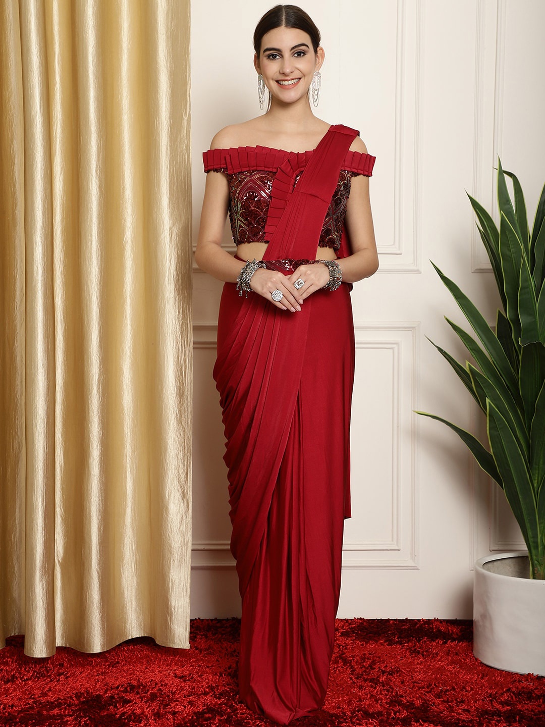 

Mitera Maroon Sequinned Ready to Wear Saree