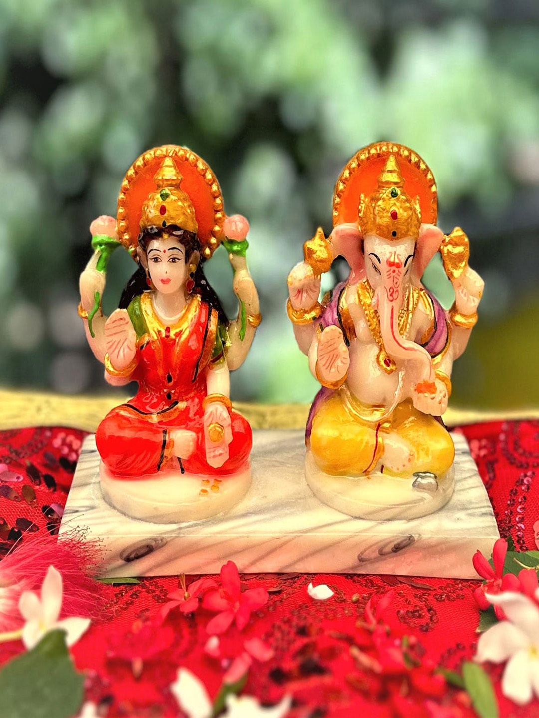 

Gallery99 Red & Beige Goddess Laxmi & Lord Ganesh Figurine Showpiece