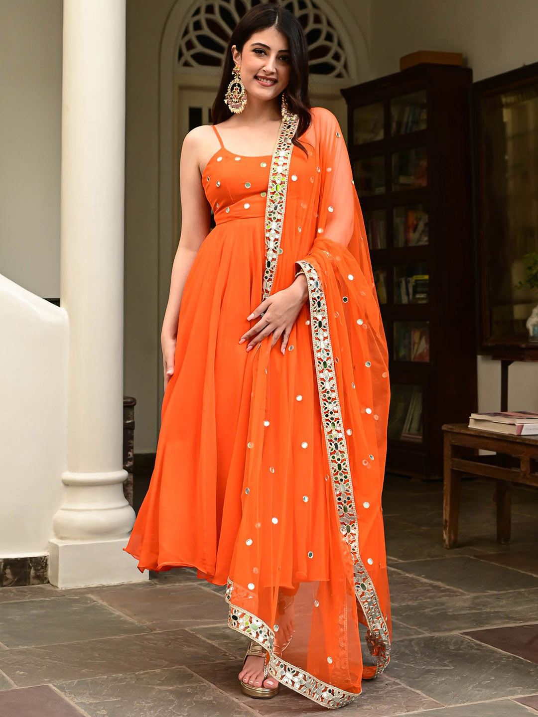 

Urbanstree Shouldeer Strap Neck Mirror Work Kurta with Trousers & With Dupatta, Orange