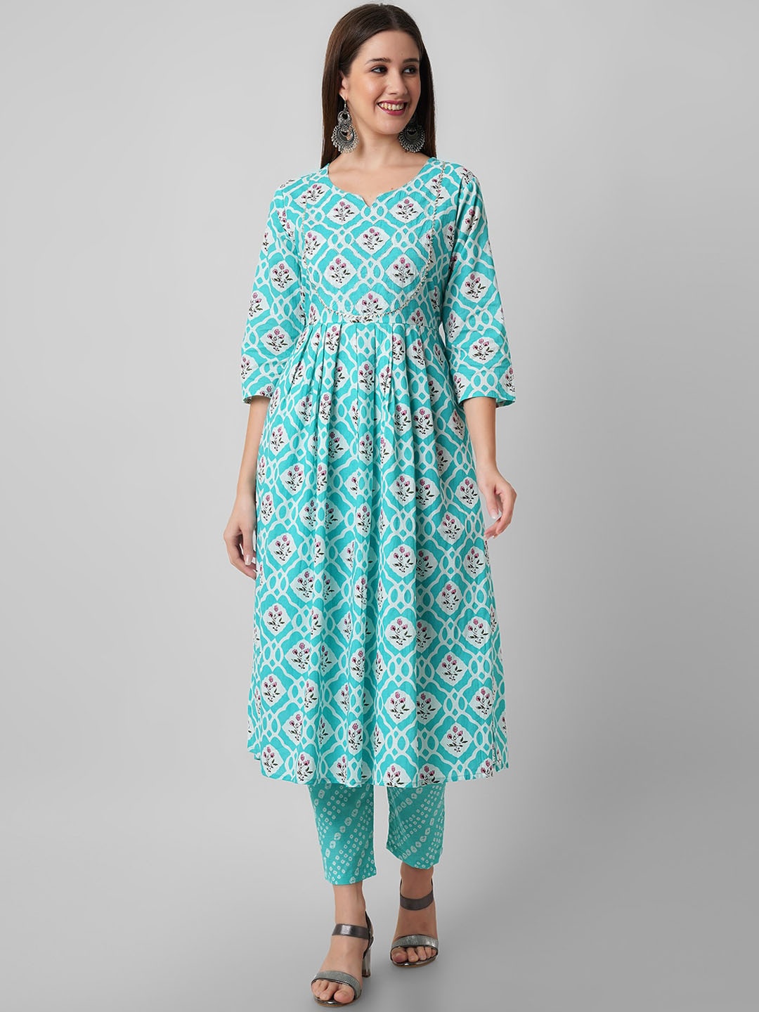 

Amayra Women Floral Printed High Slit Pure Cotton Kurta with Trousers, Turquoise blue