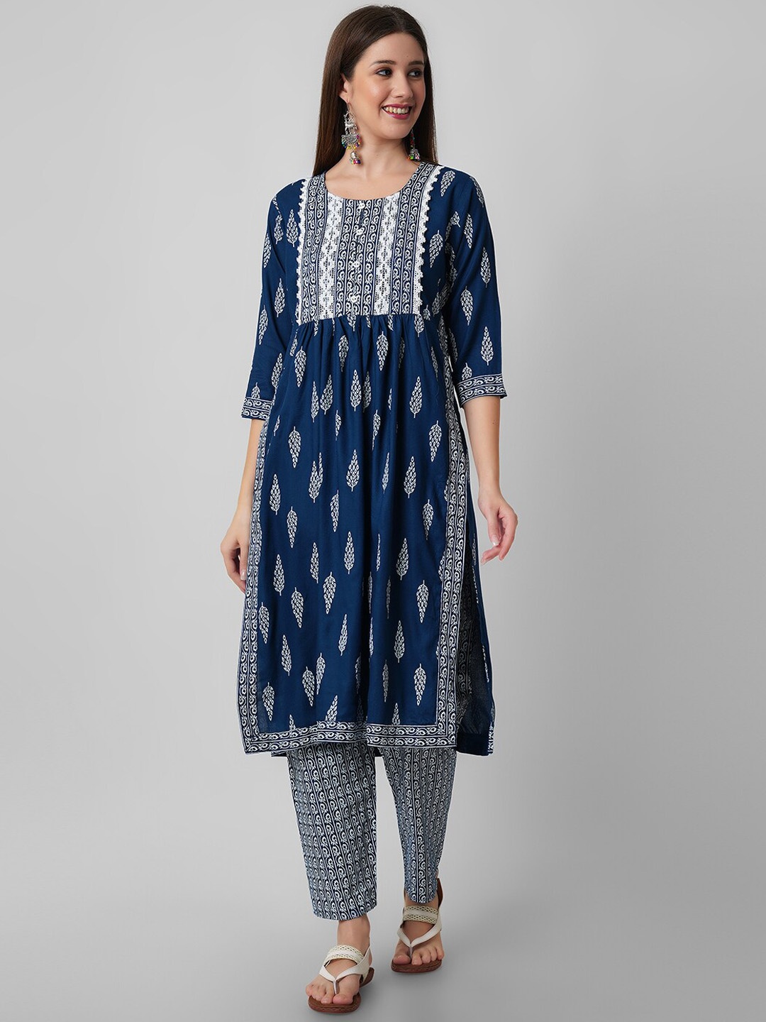 

Amayra Women Ethnic Motifs Printed Thread Work Pleated Straight Kurta & Trousers, Blue