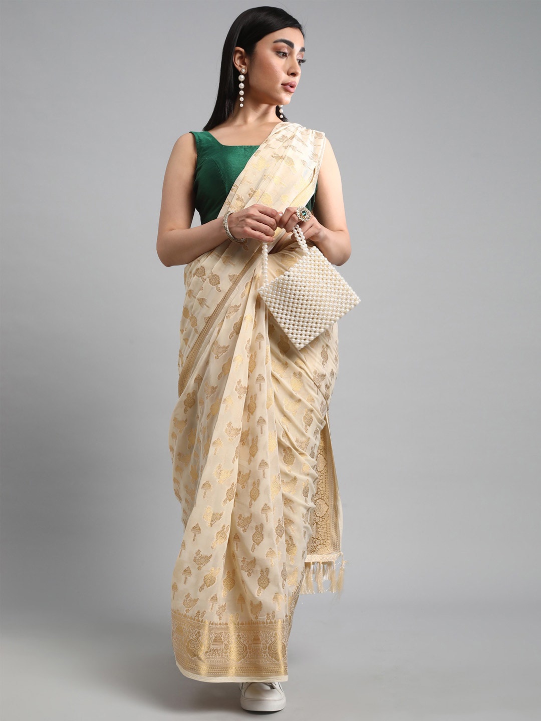 

Mitera Ethnic Motifs Woven Design Zari Poly Georgette Saree, Cream