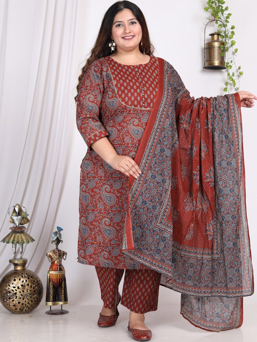 

Swasti Paisley Printed Regular Gotta Patti Pure Cotton Kurta with Trousers & With Dupatta, Maroon