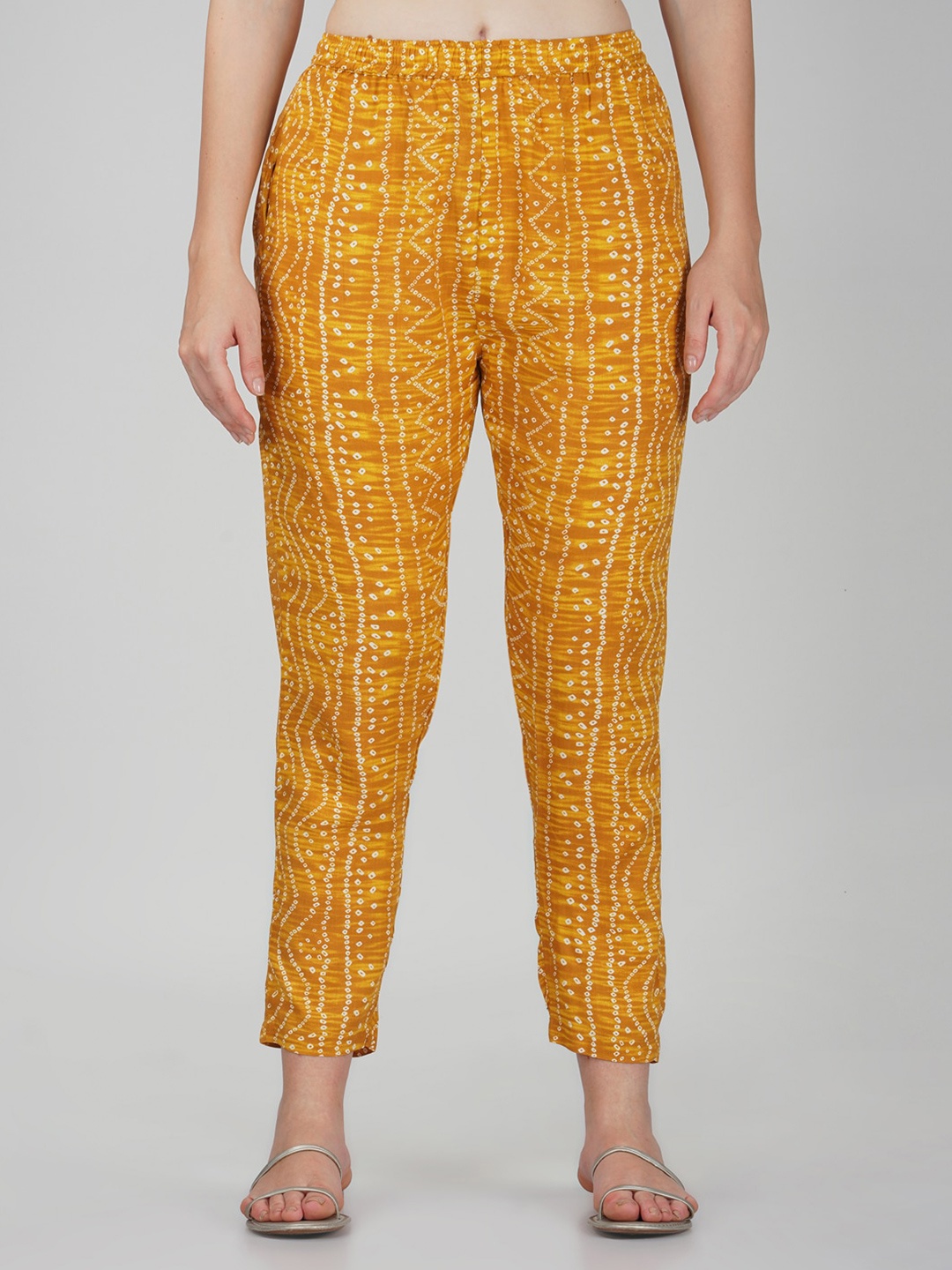

Vastraa Fusion Women Bandhani Printed Cigarette Trousers, Mustard
