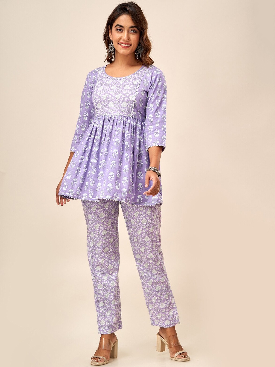 

SVARCHI Floral Printed Gotta Patti Detailed Pure Cotton A-Line Kurti With Trouser, Purple