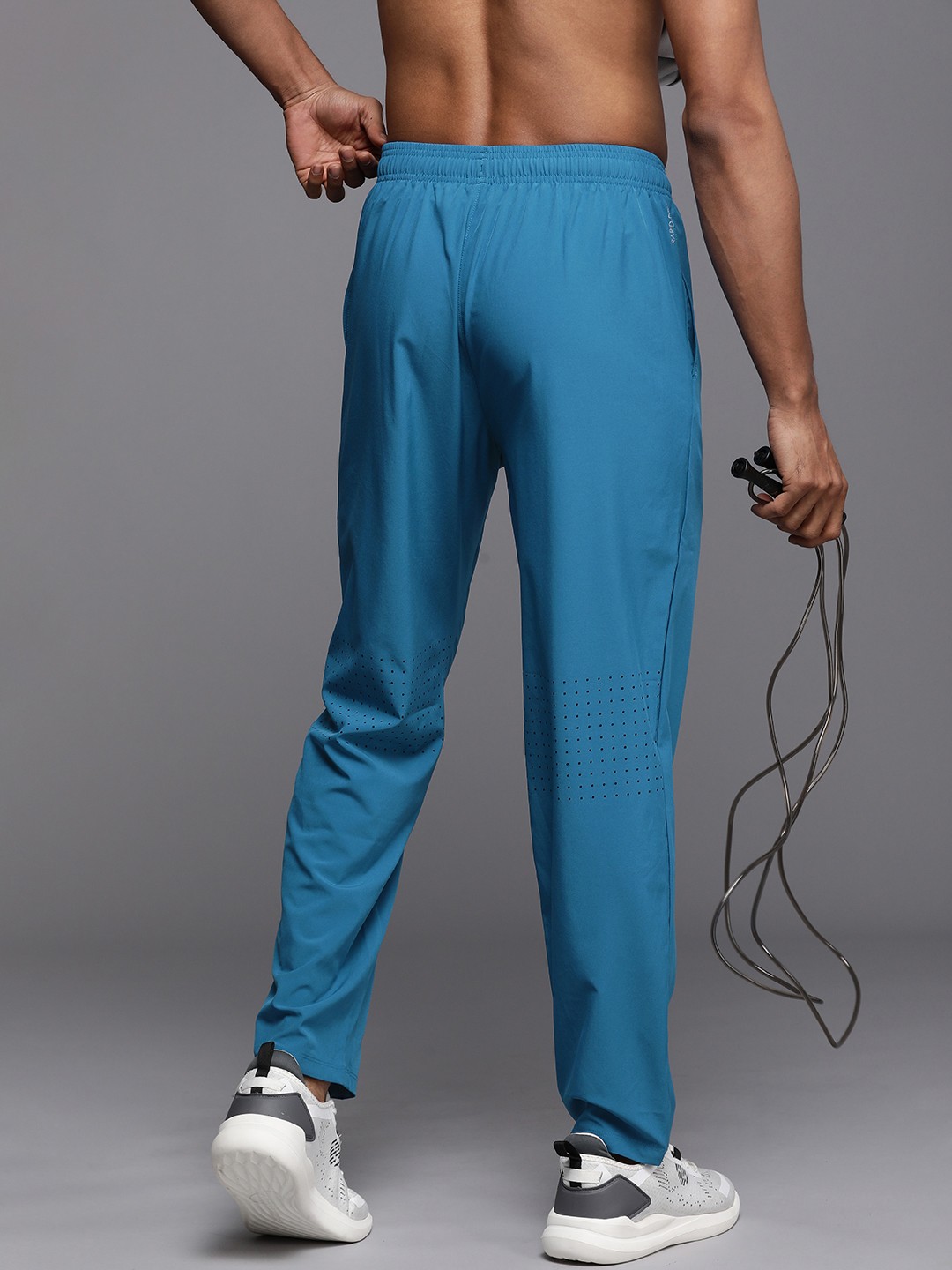 

HRX by Hrithik Roshan Men Solid Rapid-Dry Training Track Pants, Blue