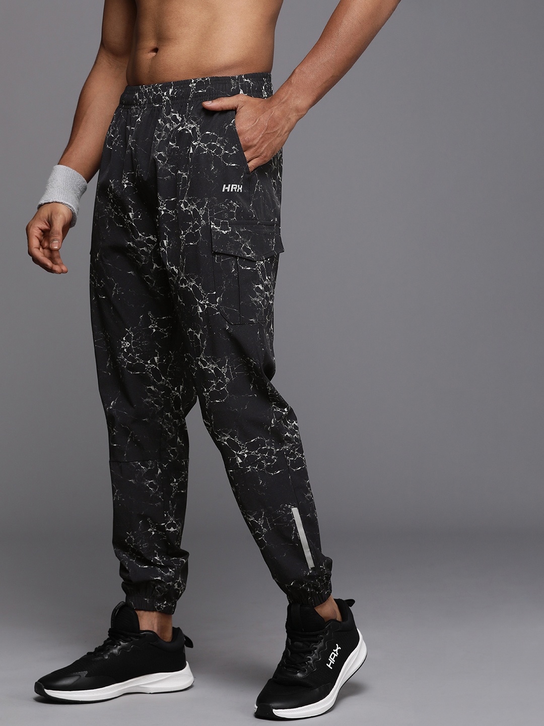 

HRX By Hrithik Roshan Men Printed Rapid-Dry Training Joggers with Reflective Detail, Black